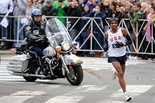 Photograph of Meb Keflezighi rounding a turn in Central Park by Henny Ray Abrams